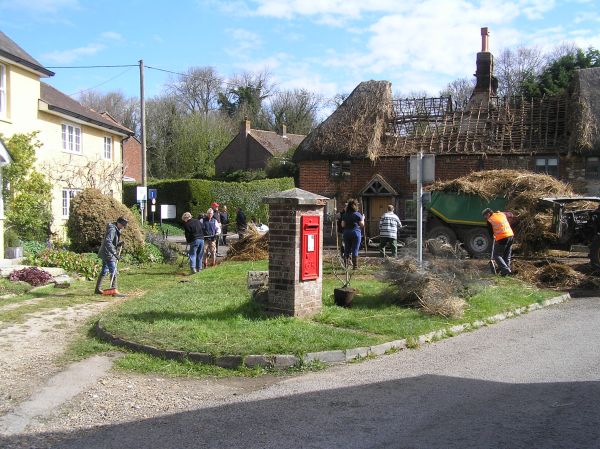 Neighbours clearing up on 11th April 2026 after Rafter House fire<