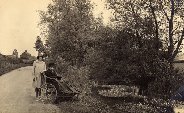 Ruth Isaac (niece of Maria Burrough) and her daughter Mabel on High Road in 1930