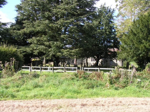 View of Bowerchalke churchyard from the cricket ground and on 29th September 2008